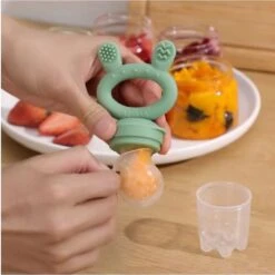 Haakaa Fruitspeen & Bijtring | Donker Blauw - Fresh Food Teether 2 In 1 | Eerste Hapjes | Vanaf 4 Maanden 13 Haakaa Fruitspeen & Bijtring | Donker Blauw - Fresh Food Teether 2 In 1 | Eerste Hapjes | Vanaf 4 Maanden -BIBS Shop 1200x1200 289